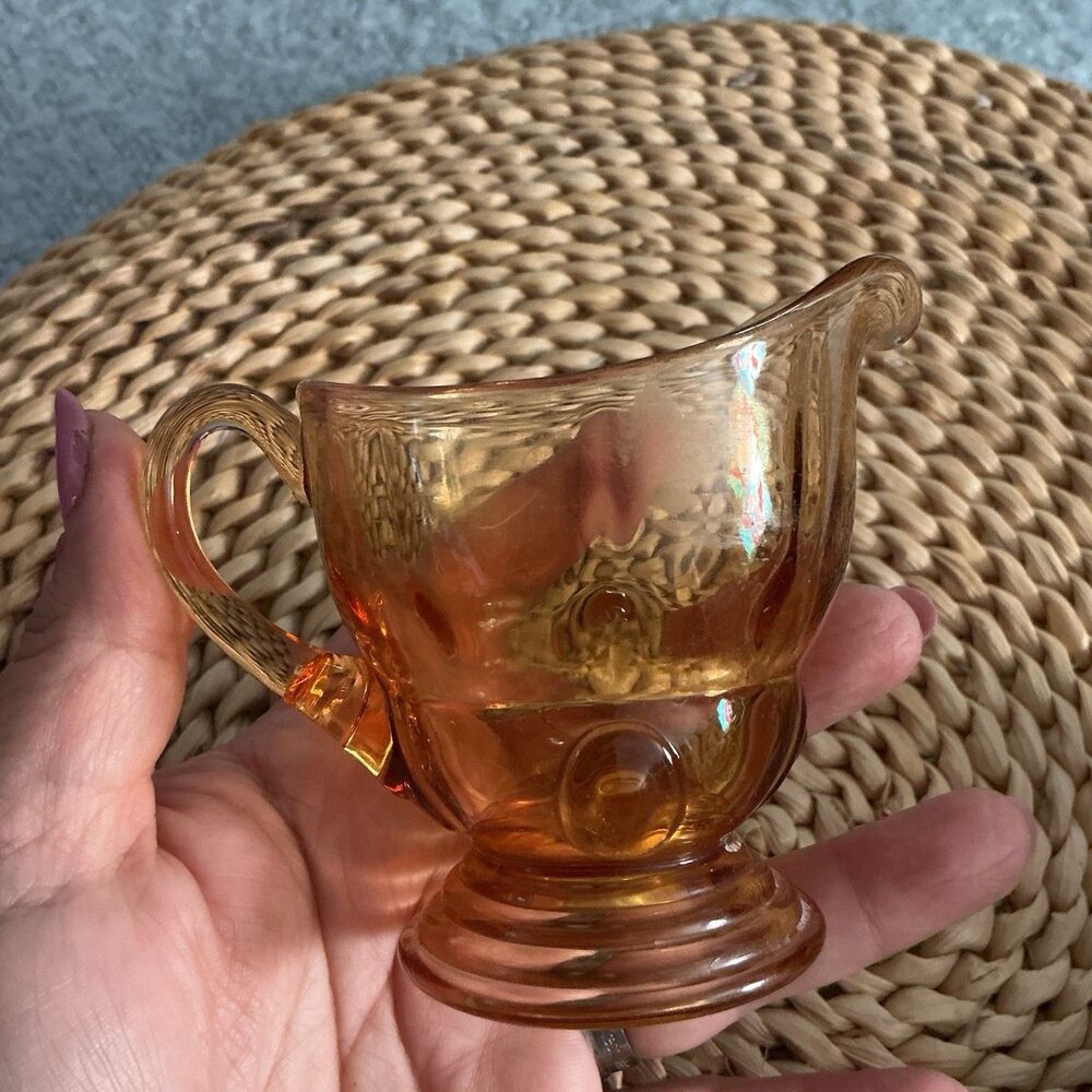 Vintage Amber Pressed Glass Footed Creamer Scroll Handle Coin Dot Desig
